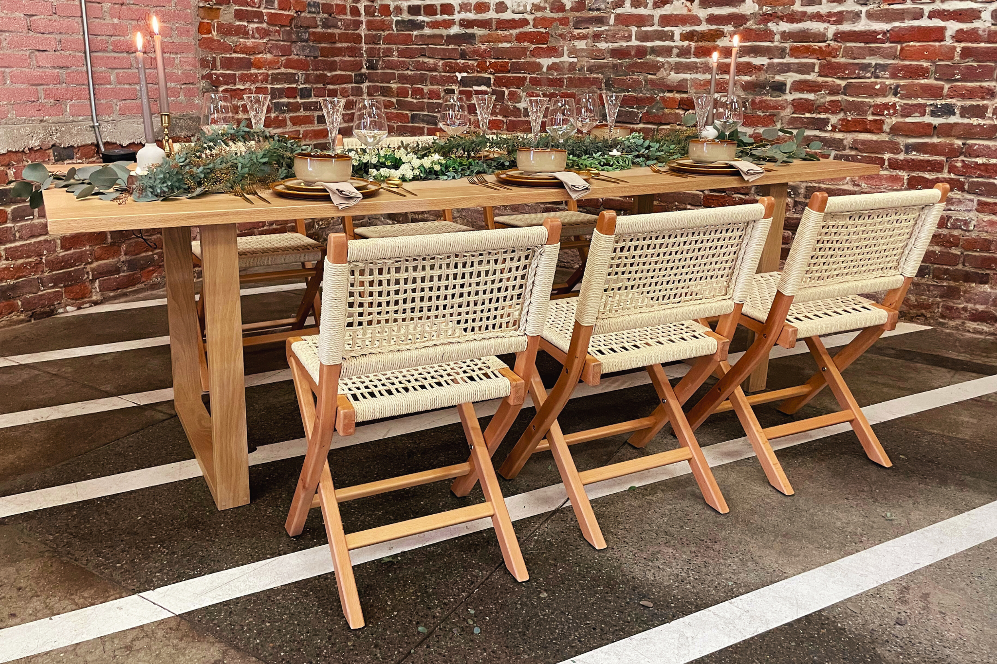 MG Studio Wedding Macrame Tablescape - bistro chairs brick wall glassware